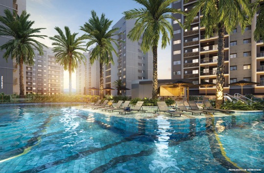 Piscina com raia de 25 metros e área de lazer do We Barra by Living